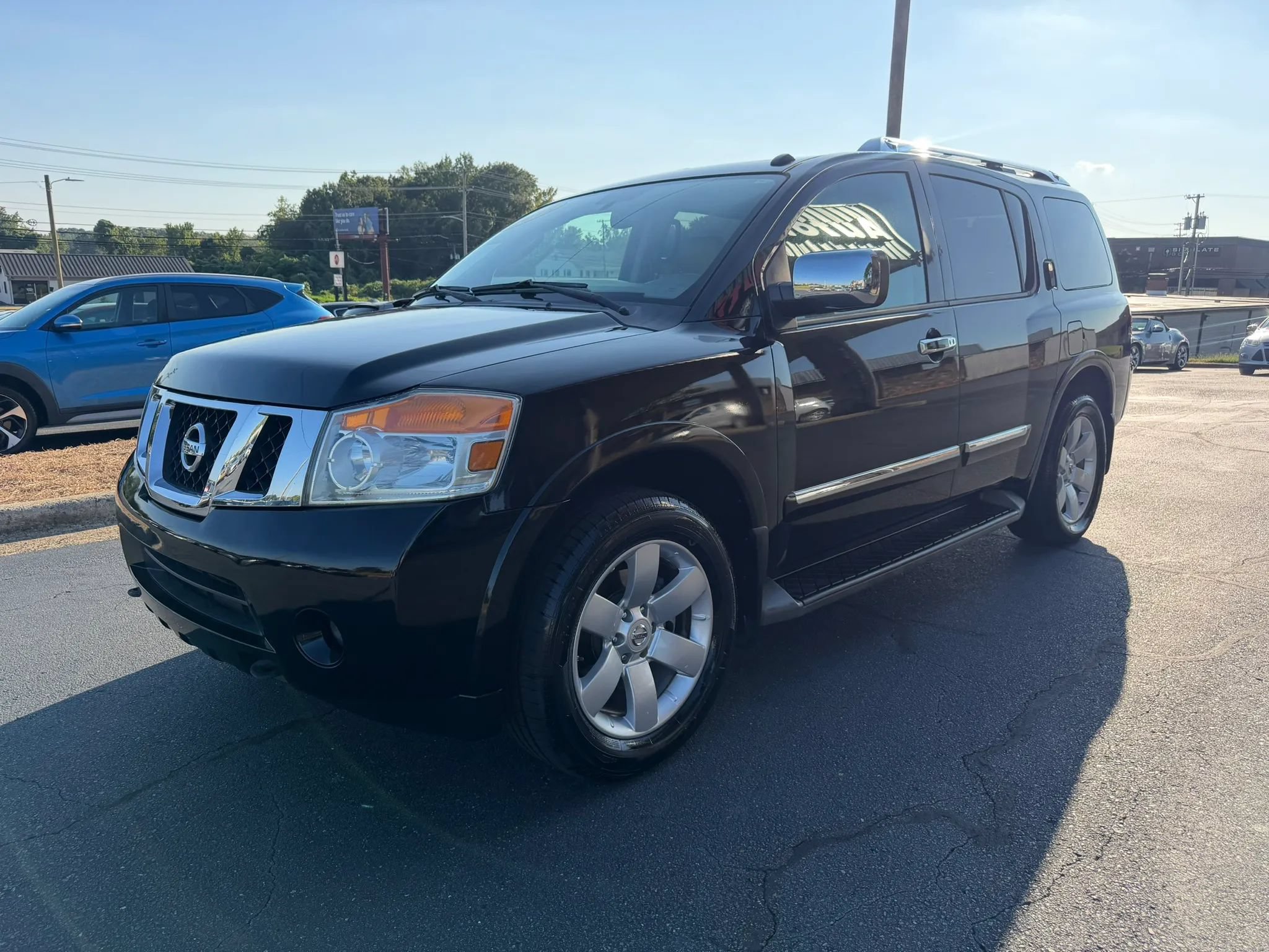 Used 2012 Nissan Armada SL w/ DVD FES Pkg RWD image 3