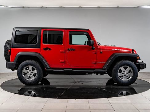 Used 2012 Jeep Wrangler Unlimited Rubicon w/ Dual Top Group AWD/4WD image 11