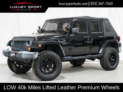 Used 2010 Jeep Wrangler Unlimited Sahara w/ Dual Top Group