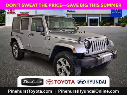 Used 2016 Jeep Wrangler Unlimited Sahara w/ Dual Top Group AWD/4WD image 1