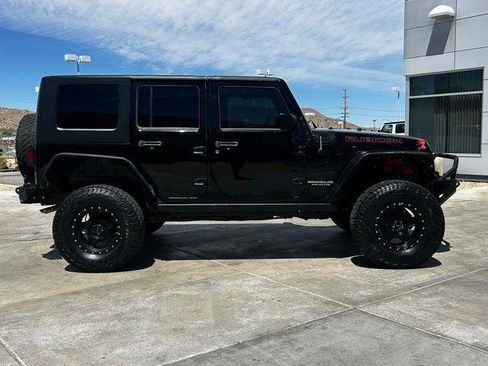 Used 2009 Jeep Wrangler Unlimited Rubicon w/ Dual Top Group AWD/4WD image 9