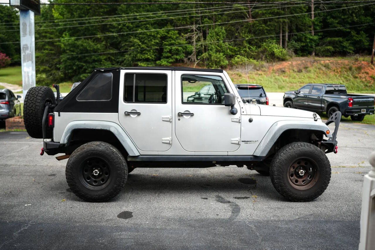 Used 2012 Jeep Wrangler Unlimited Rubicon w/ Dual Top Group AWD/4WD image 27