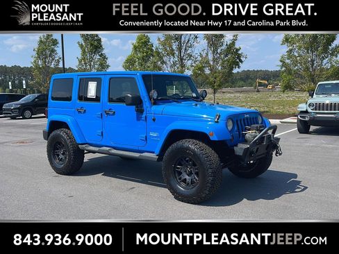 Used 2011 Jeep Wrangler Unlimited Sahara w/ Dual Top Group AWD/4WD image 1