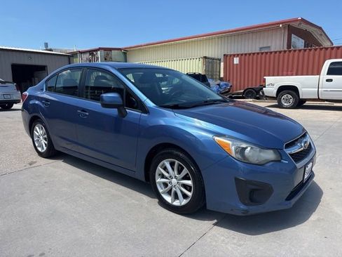 Used 2014 Subaru Impreza 2.0i Premium w/ All-Weather Package w/CVT AWD/4WD image 1