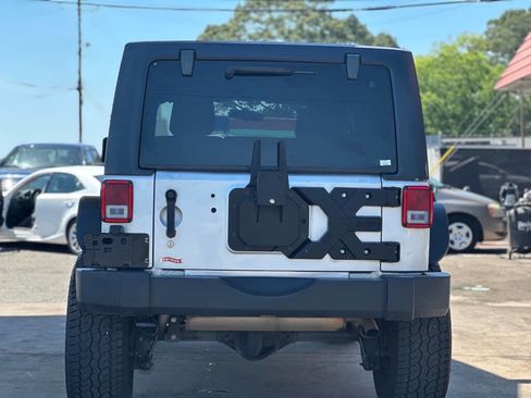 Used 2012 Jeep Wrangler Unlimited Sport AWD/4WD image 9