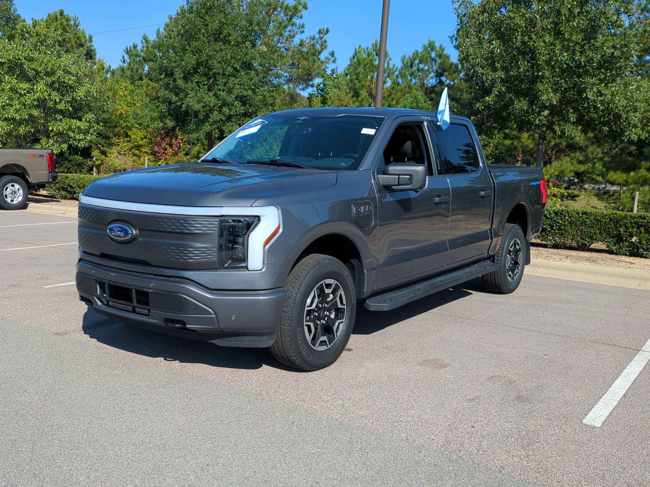 Certified 2023 Ford F150 Lightning XLT AWD/4WD image 8