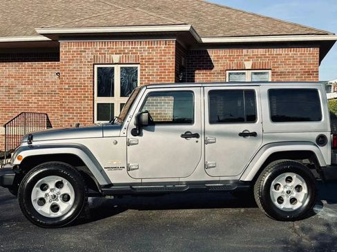 Used 2014 Jeep Wrangler Unlimited Sahara w/ Dual Top Group image 7