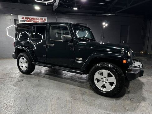 Used 2012 Jeep Wrangler Unlimited Sahara w/ Dual Top Group AWD/4WD image 7