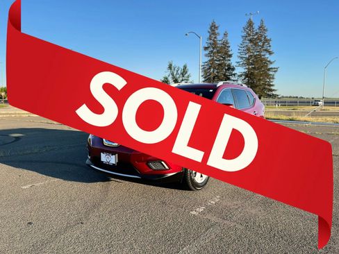 Used 2015 Nissan Rogue SV AWD/4WD image 1