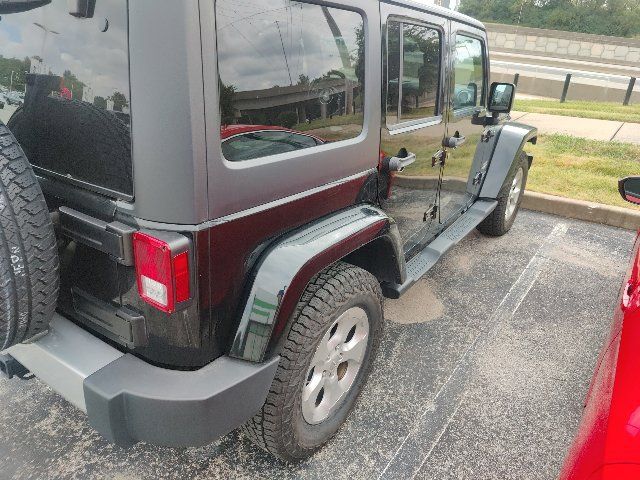 Used 2014 Jeep Wrangler Unlimited Sahara w/ Dual Top Group AWD/4WD image 17