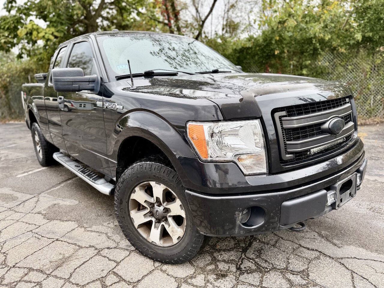 Used 2013 Ford F150 STX w/ Mid Equipment Group AWD/4WD image 1