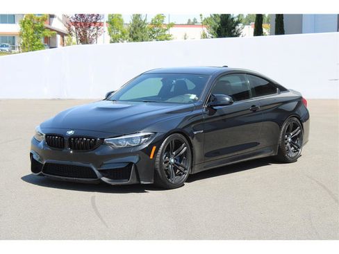 Used 2015 BMW M4 Coupe w/ Executive Package RWD image 1
