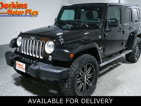Used 2016 Jeep Wrangler Unlimited Sahara w/ Dual Top Group AWD/4WD image 1