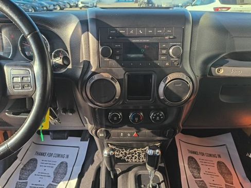 Used 2012 Jeep Wrangler Unlimited Sport w/ Black Appearance Group AWD/4WD image 24