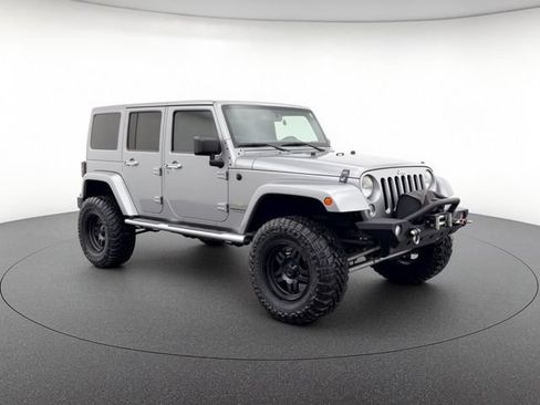 Used 2014 Jeep Wrangler Unlimited Sahara w/ Mopar Chrome Edition Group AWD/4WD image 7
