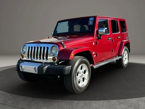 Used 2013 Jeep Wrangler Unlimited Sahara w/ Mopar Chrome Edition Group image 1