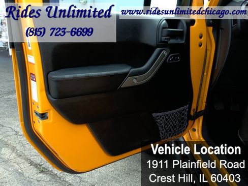 Used 2013 Jeep Wrangler Unlimited Sahara w/ Dual Top Group AWD/4WD image 11