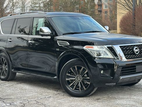 Certified 2019 Nissan Armada Platinum w/ Captain's Chairs Package image 1