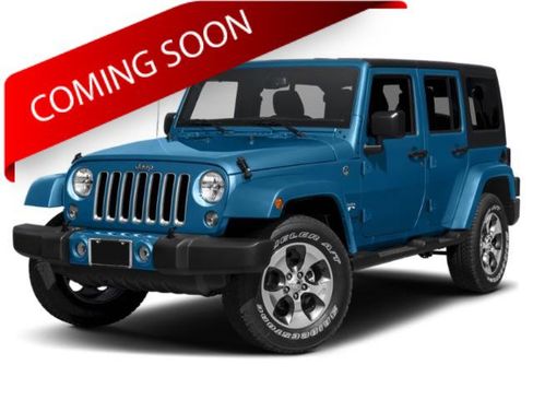 Used 2015 Jeep Wrangler Unlimited Sahara AWD/4WD image 1