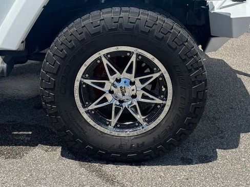 Used 2014 Jeep Wrangler Unlimited Sahara w/ Mopar Chrome Edition Group AWD/4WD image 6