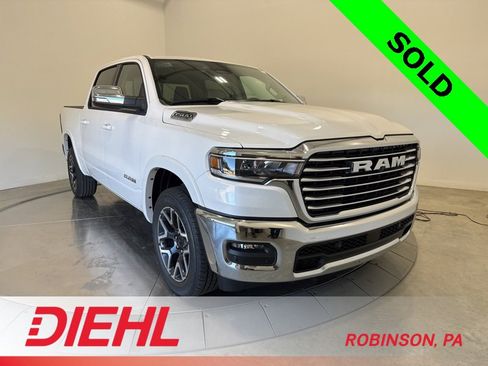New 2026 RAM 1500 Laramie w/ Bed Utility Group image 1