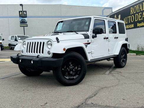 Used 2015 Jeep Wrangler Unlimited Sahara AWD/4WD image 1