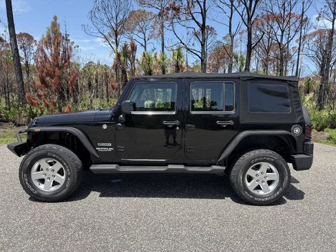 Used 2012 Jeep Wrangler Unlimited Sport w/ Connectivity Group AWD/4WD image 2