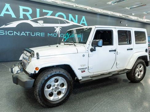 Used 2013 Jeep Wrangler Unlimited Sahara w/ Trailer Tow Group image 1