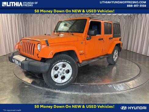 Used 2013 Jeep Wrangler Unlimited Sahara w/ Trailer Tow Group image 1
