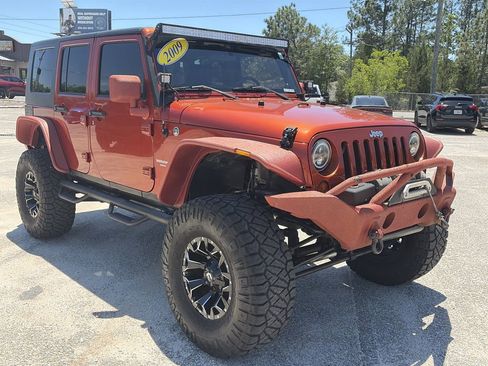 Used 2009 Jeep Wrangler Unlimited Rubicon w/ Dual Top Group AWD/4WD image 9