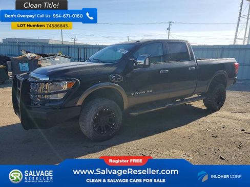 Used 2016 Nissan Titan Platinum Reserve AWD/4WD image 1