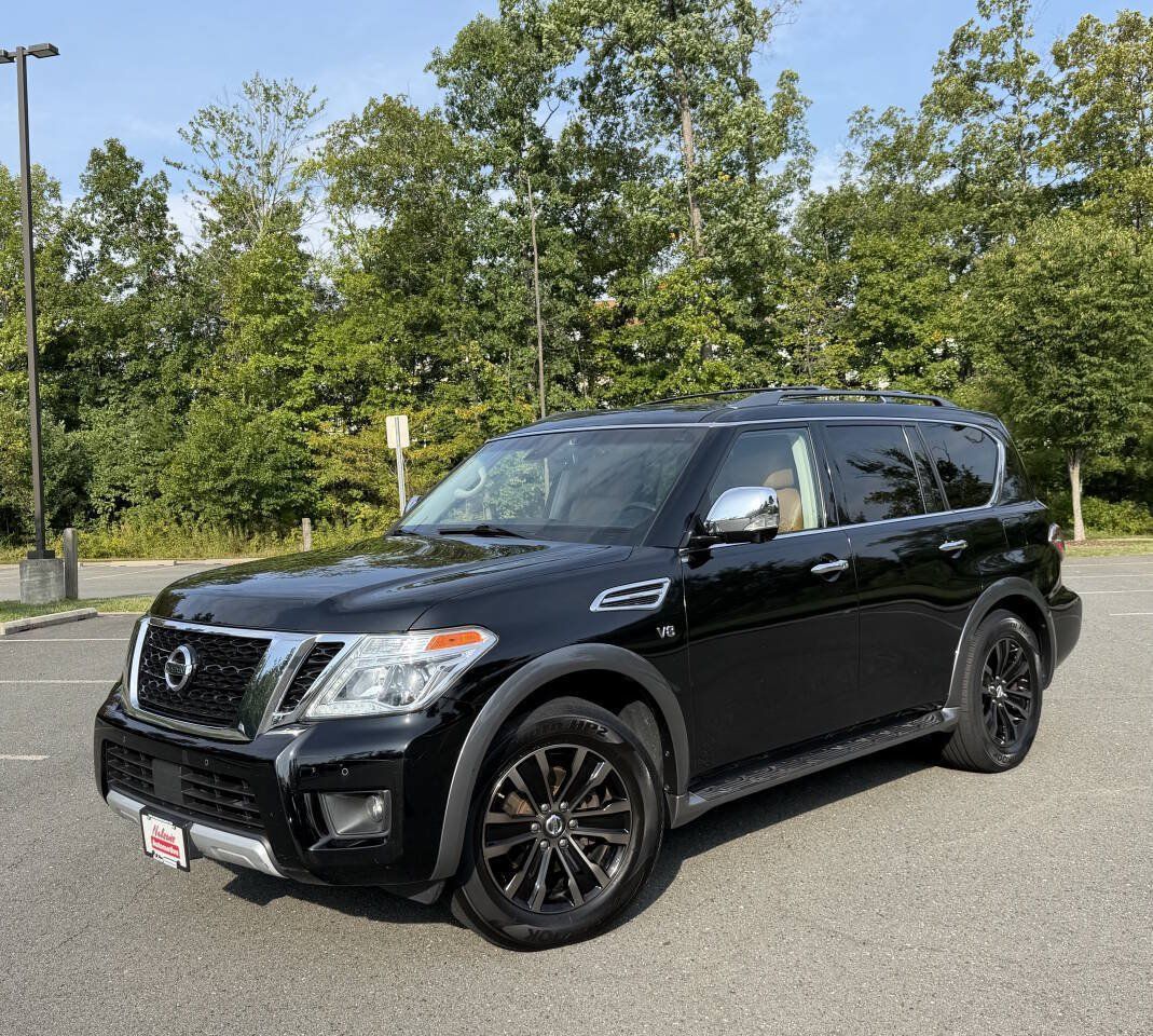 Used 2017 Nissan Armada Platinum w/ Captain Seat Package AWD/4WD image 1