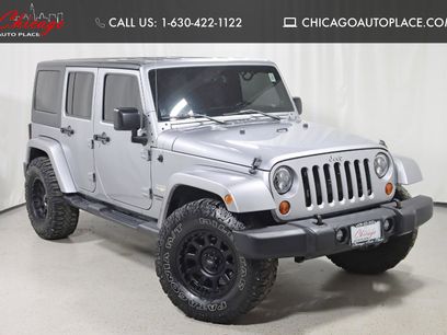 Used 2013 Jeep Wrangler Unlimited Sahara w/ Dual Top Group