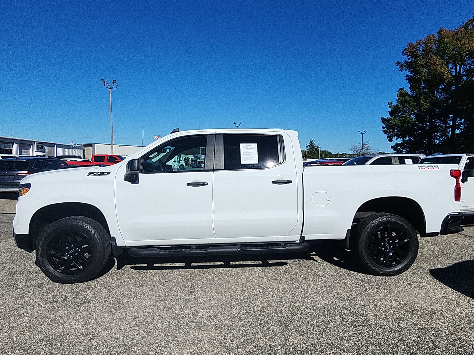 Used 2025 Chevrolet Silverado 1500 Custom Trail Boss w/ Turbomax Blackout Package AWD/4WD image 2