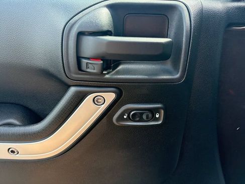 Used 2013 Jeep Wrangler Unlimited Sahara w/ Mopar Chrome Edition Group AWD/4WD image 16