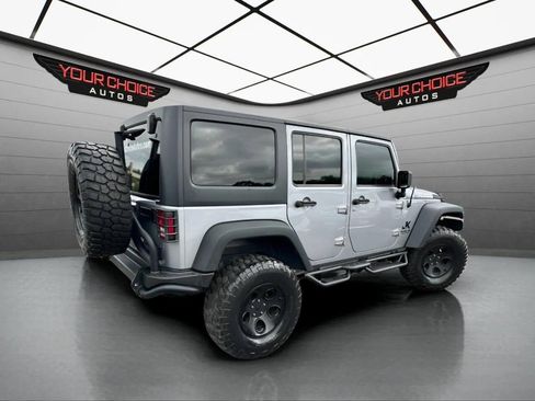 Used 2015 Jeep Wrangler Unlimited Rubicon w/ Dual Top Group AWD/4WD image 5
