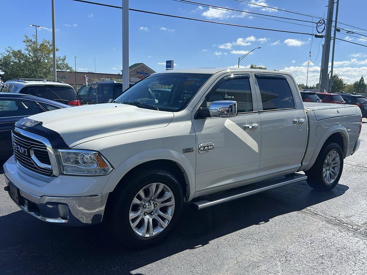 Used 2016 RAM 1500 Laramie Longhorn AWD/4WD image 2