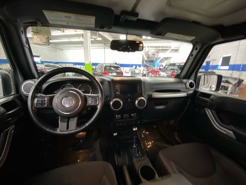 Used 2014 Jeep Wrangler Unlimited Sahara w/ Dual Top Group AWD/4WD image 28