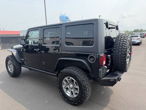 Used 2013 Jeep Wrangler Unlimited Rubicon w/ Dual Top Group AWD/4WD image 6