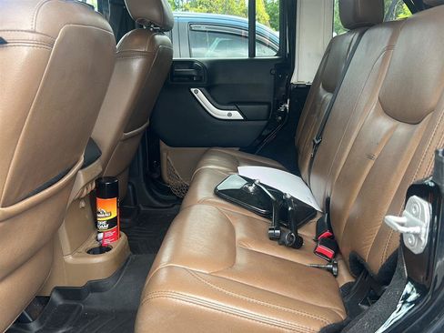Used 2013 Jeep Wrangler Unlimited Sahara w/ Dual Top Group AWD/4WD image 13