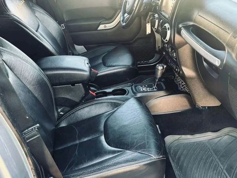 Used 2014 Jeep Wrangler Unlimited Sahara w/ Dual Top Group image 16