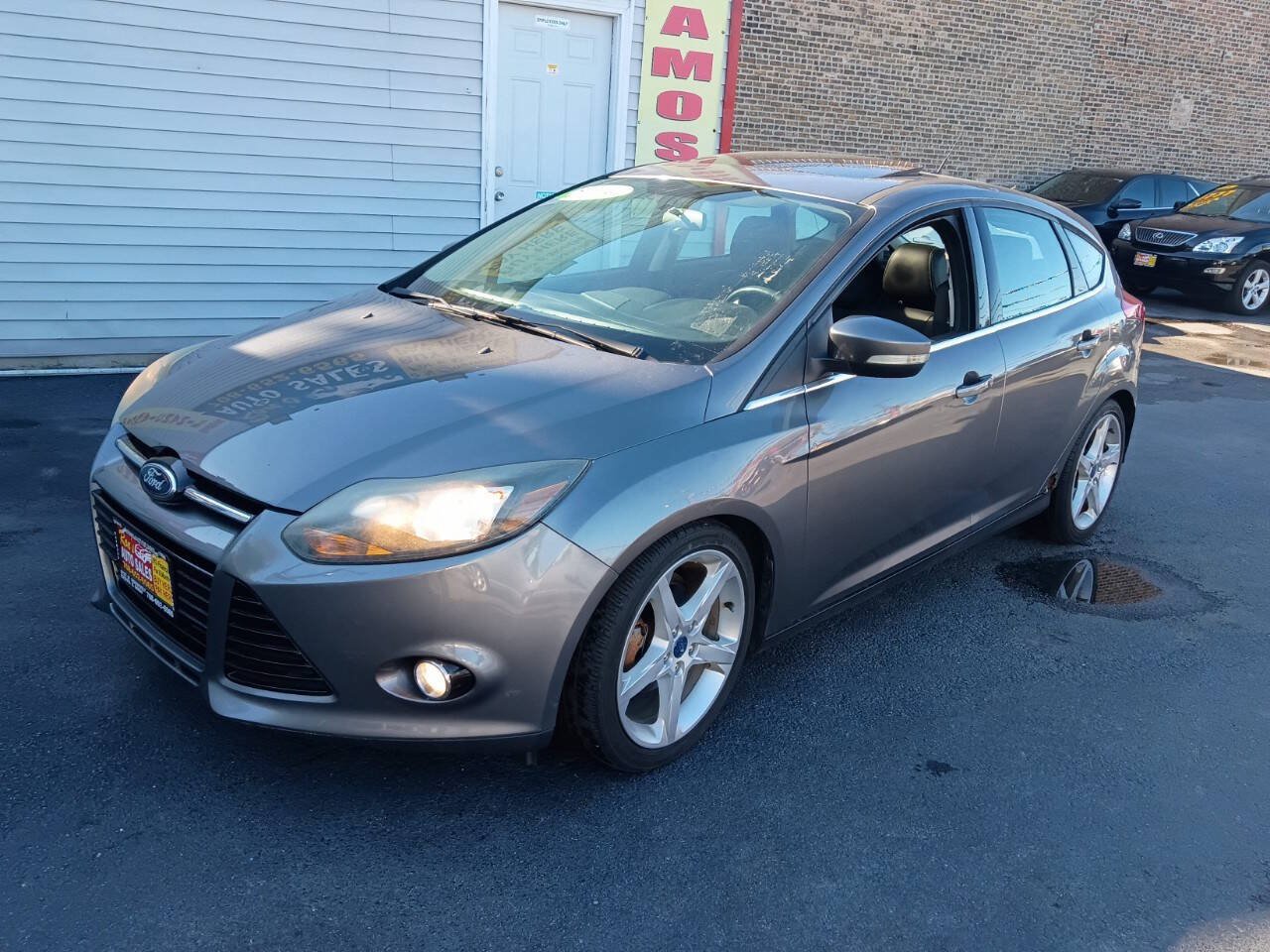 Used 2014 Ford Focus Titanium w/ Luxury Package FWD image 1