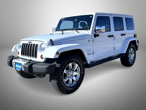Used 2013 Jeep Wrangler Unlimited Sahara w/ Dual Top Group image 1