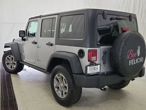 Used 2014 Jeep Wrangler Unlimited Rubicon w/ Dual Top Group AWD/4WD image 8