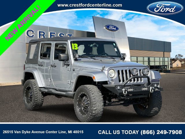 Used 2013 Jeep Wrangler Unlimited Sahara w/ Dual Top Group AWD/4WD image 1