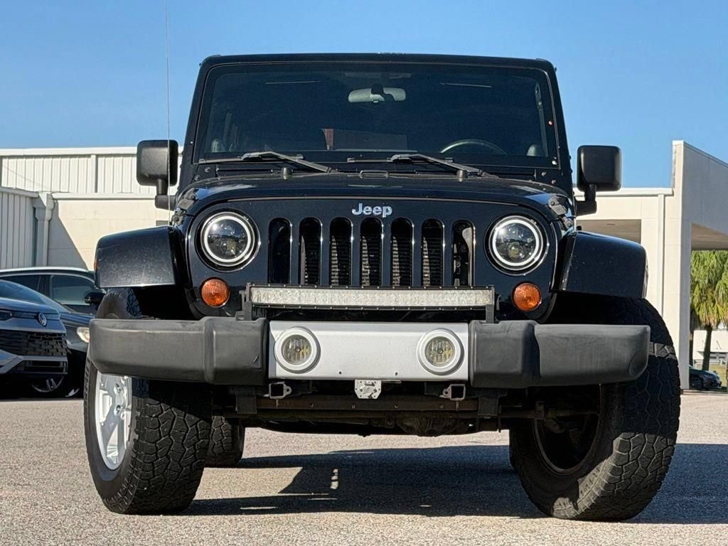 Used 2012 Jeep Wrangler Unlimited Sahara AWD/4WD image 2