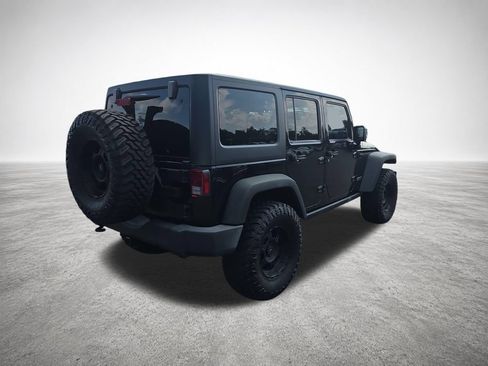 Used 2015 Jeep Wrangler Unlimited Rubicon w/ Dual Top Group AWD/4WD image 8