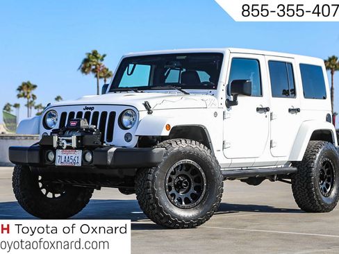Used 2015 Jeep Wrangler Unlimited Sahara AWD/4WD image 1