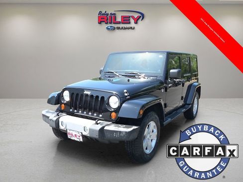 Used 2012 Jeep Wrangler Unlimited Sahara w/ Dual Top Group image 1