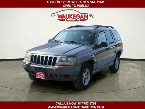 Used 1999 Jeep Grand Cherokee Laredo AWD/4WD image 1